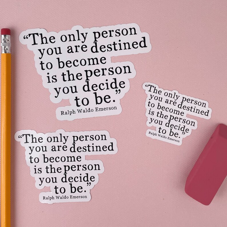 May include: Two white stickers with black text on a pink background. The text on the stickers reads "The only person you are destined to become is the person you decide to be."  The text is attributed to Ralph Waldo Emerson.