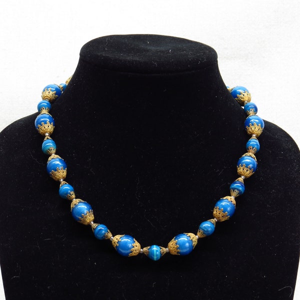Gorgeous Vintage Hand Spun Blue Glass Beaded Choker Style Necklace with Ornate Gold Tone Brass Spacer Bead Caps.