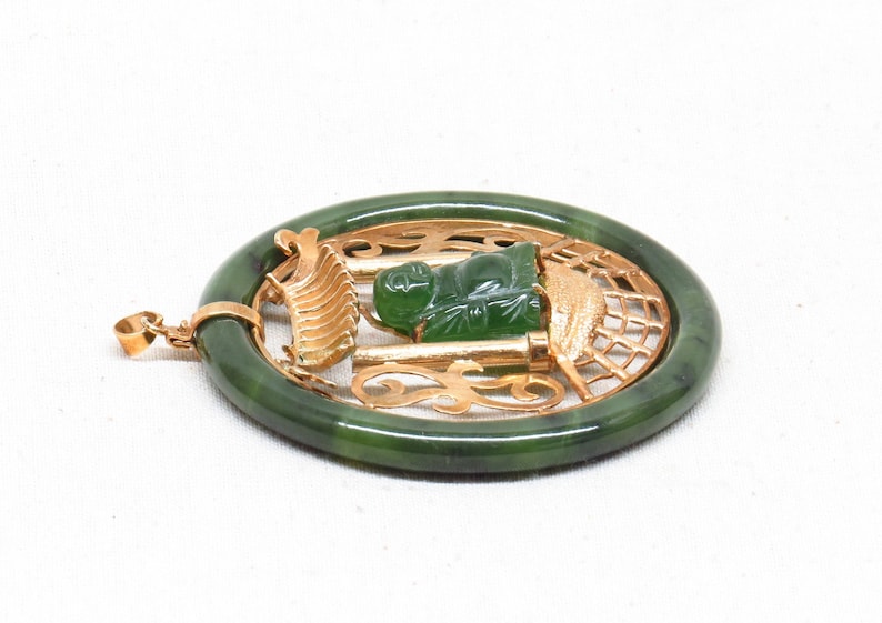 Large Vintage Hand Carved Chinese Spinach Jade Hotei Buddha Sitting in a Golden Pagoda Pendant.