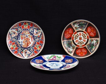 Set of Three Vintage Japanese Imari Plates Floral and Geisha Motifs.