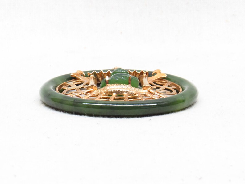Large Vintage Hand Carved Chinese Spinach Jade Hotei Buddha Sitting in a Golden Pagoda Pendant.