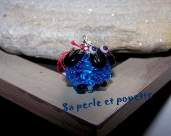 Pendentif mouton turquoise transparent en verre