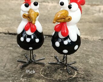 Couple poulettes noires à pois blanc