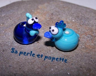 Couple de -poulettes turquoise transparent et turquoise