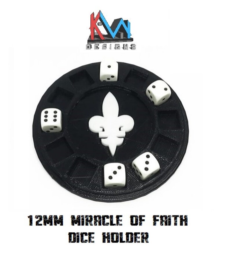 May include: Black dice holder with a white fleur-de-lis design in the center, holding six white dice. The holder has slots for each die. The text "12MM MIRACLE OF FAITH DICE HOLDER" is printed at the bottom. The holder is a gaming accessory.