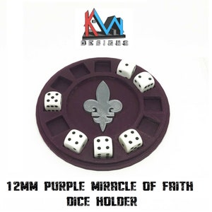 May include: A purple dice holder with a fleur-de-lis design in the center, holding six white dice with black dots. The holder has square compartments for dice and the text "12MM PURPLE MIRACLE OF FAITH DICE HOLDER".