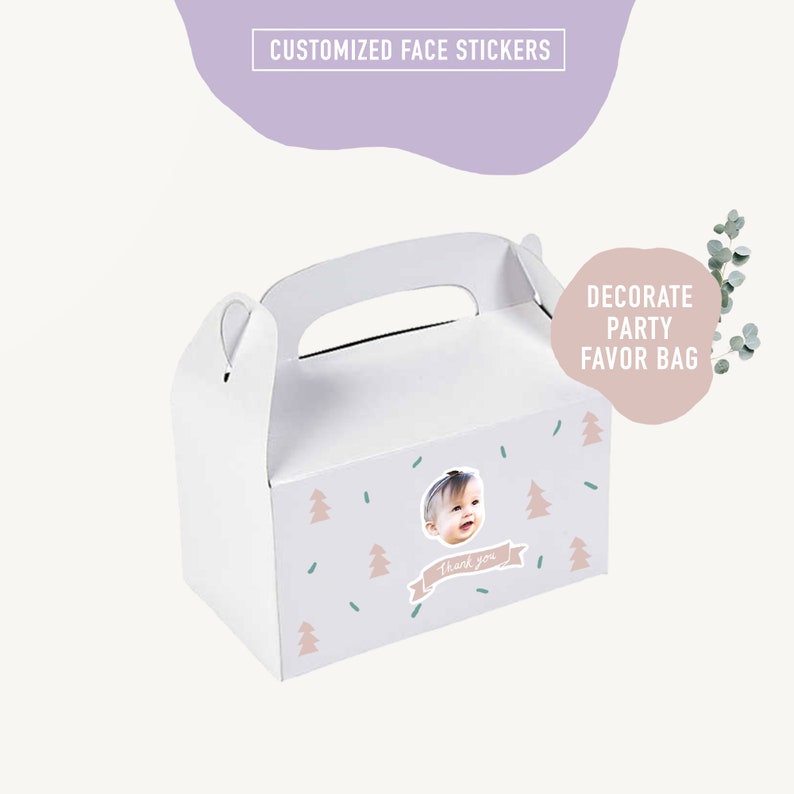May include: White party favor bag with a handle. The bag has a light blue background with a pink and green woodland design. A photo of a baby is in a circle on the front of the bag. The text "Thank you" is on a pink banner.