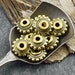 see more listings in the Metal / Spacer Beads section