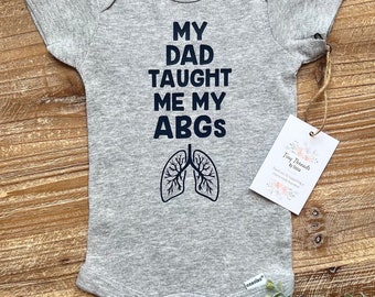 My Dad Taught Me My ABGs Onesie® | Doctor Onesie® | Baby Onesie® | Baby Boy Onesie® | Baby Girl Onesie® | Baby Tee | Custom Baby Onesie®