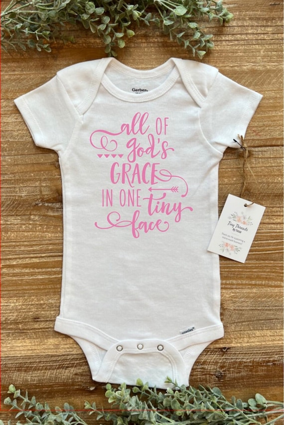 All Of God's Grace In One Little Face Christian Baby Bodysuit All Of God's Grace In One Little Face Christian Baby Bodysuit