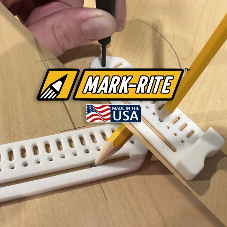 May include: A white Mark-Rite tool with a pencil inserted, used for drawing circles. The tool has a ruler-like design with multiple holes and the text "MARK-RITE" and "MADE IN THE USA" on the image.