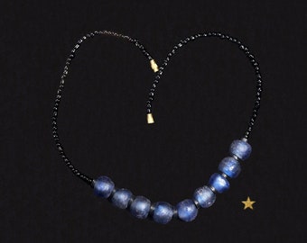 Old African necklace in blue, black glass paste