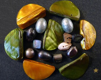 Mother of various shapes beads of green, ochre, grey