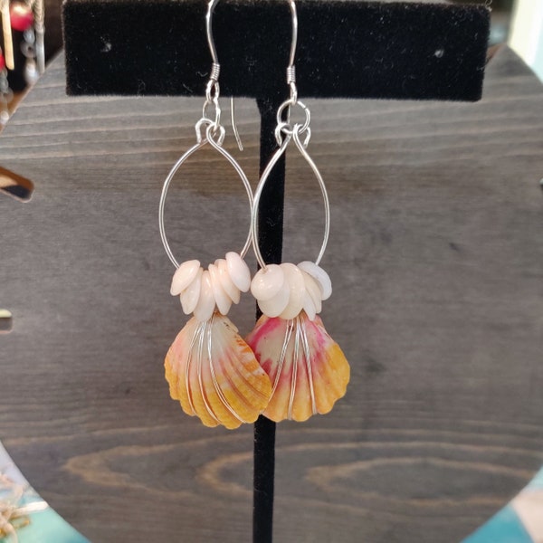 Made in Hawaii ,Sunrise shells and puka shells from Kauai beachs solid Sterling silver earrings, light weight .