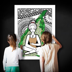May include: Two children are coloring a black and white illustration of a woman meditating in a lotus position surrounded by green leaves and flowers. The woman has long brown hair and is wearing a brown tank top. The illustration is on a white background.