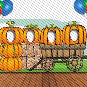 May include: A photo booth backdrop featuring a wooden wagon with three orange pumpkins. The pumpkins have holes cut out for faces. The wagon is on a green grassy field with hay bales on either side.