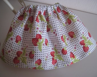 habit de poupée /jupe élastiquée /imprimé 'fraises 'pour poupée de 33 cms a 36 cms /