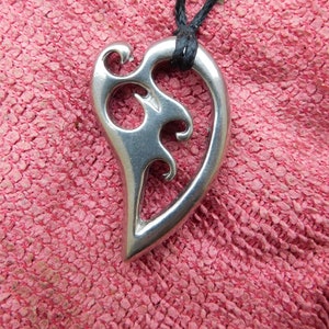 Handcrafted Harp Spiral Pendant, Represents New Beginnings and Harmonious Growth, Surf-inspired Jewellery. Handmade by William Sturt