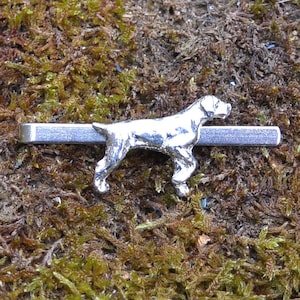 May include: Silver tie bar featuring a detailed, three-dimensional silhouette of a German Shorthaired Pointer dog.