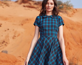 slim fit dress slacks Women's Wrapped in Cheer Navy Plaid Mini Dress | Size: L main image 1