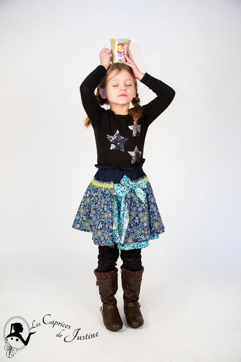 Ruffled girl skirt with neon turquoise blue elastic waist with floral and mandala motifs from 2 years to 8 years old