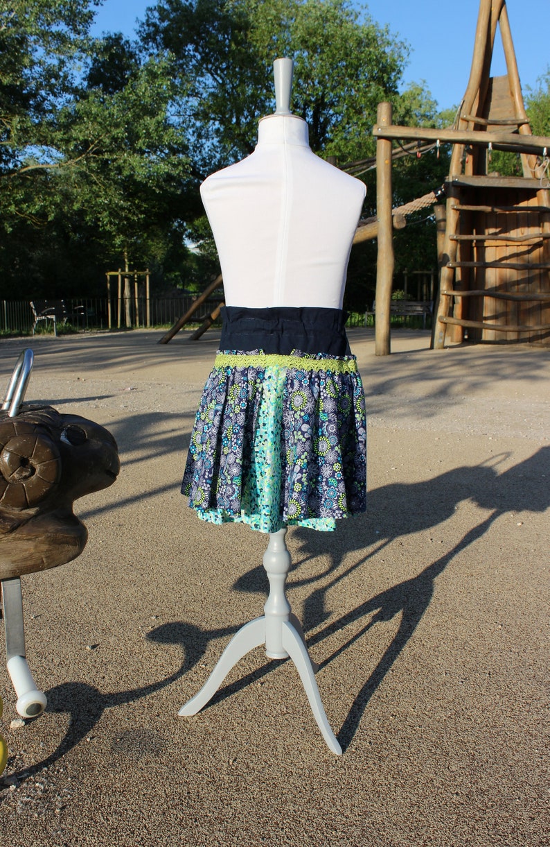 Ruffled girl skirt with neon turquoise blue elastic waist with floral and mandala motifs from 2 years to 8 years old