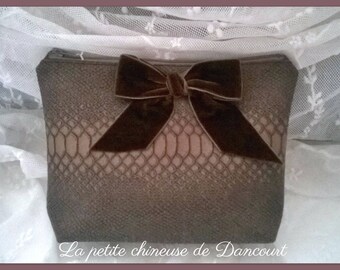 Brown faux leather clutch