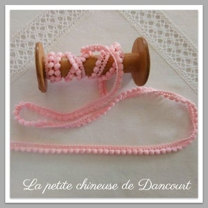 Treccia con pompon