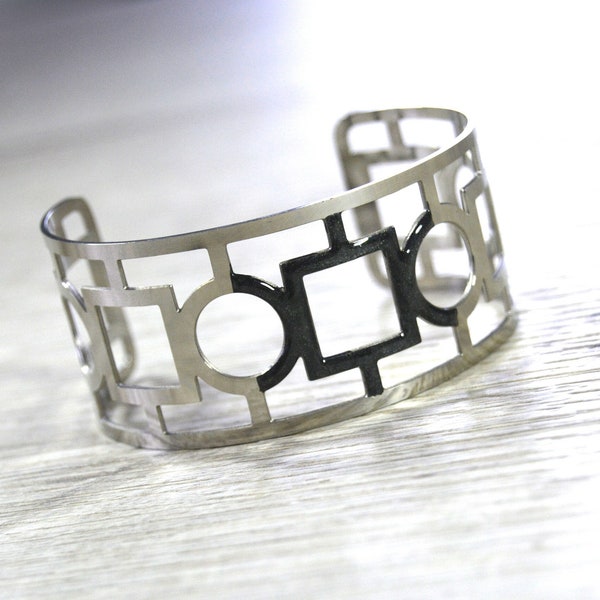 Bracelet manchette large ajouré noir acier inoxydable rond carré géométrique original