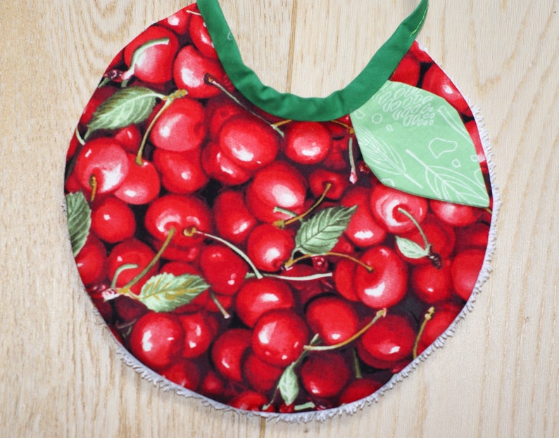 oval cherry bib