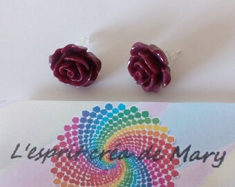 a pair of Burgundy Flower Earrings