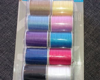 set of 10 spools of thread sewing various colors