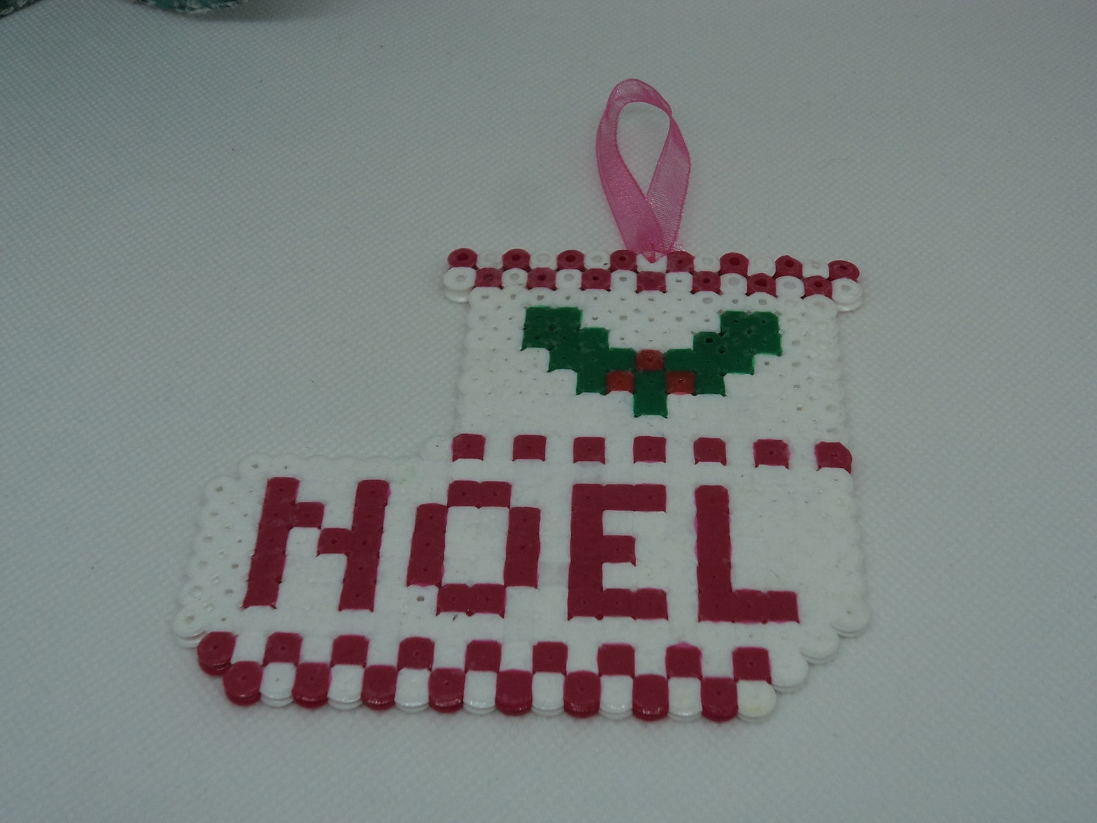 a ballet shoe christmas with its holly in pearls hama (pixel art) for the front door, the top of the tree or fireplace