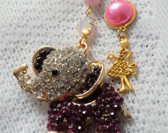 Bag or rearview mirror jewelry, key ring, gold and pink, glass beads, metal beads, cabochon, charm, elephant pendant garnished with rhinestones.