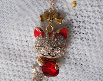 Bag charm, key ring, gold, red and white colour, glass beads, metal beads, charm, large cat pendant adorned with rhinestones.