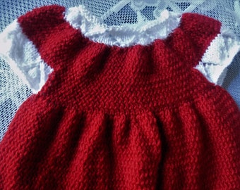 Knitted baby dress, short sleeves, red and white, size 3 to 6 months.