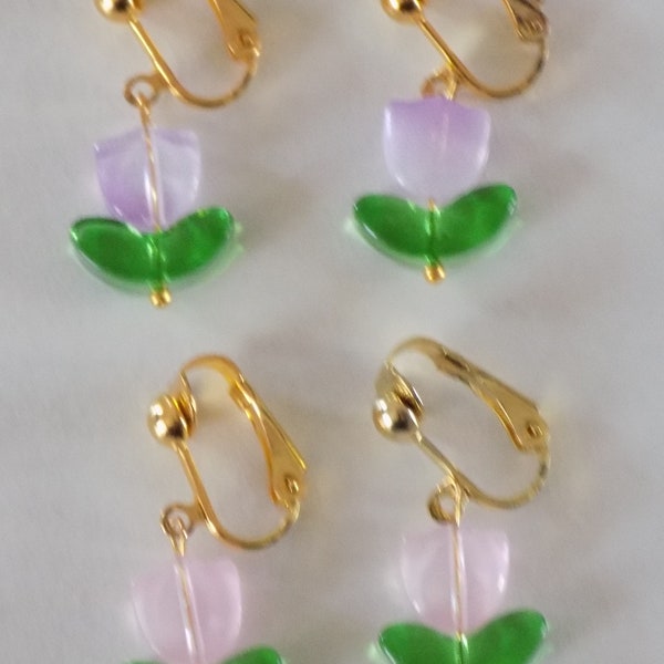 Clip-on earrings, tulip flower, gold and pale pink or mauve colors.