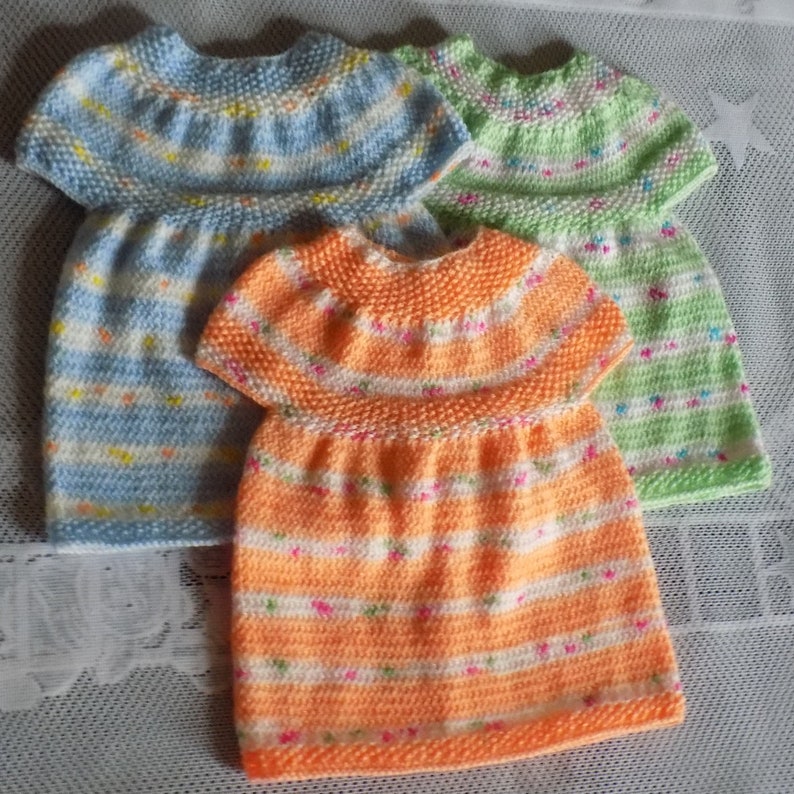 Baby dress handmade knitted,3 colors available birth size at 3 months.