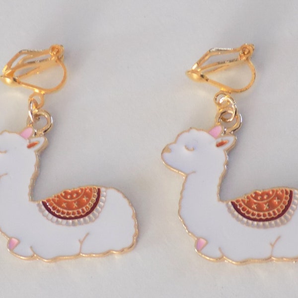 Clip-on earrings, alpaca pendant, gold, white, red colors.