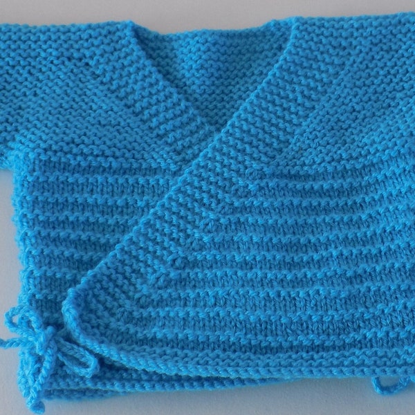 Brassière croisée gilet pour bébé tricoté main coloris bleu turquoise taille naissance/1 mois.