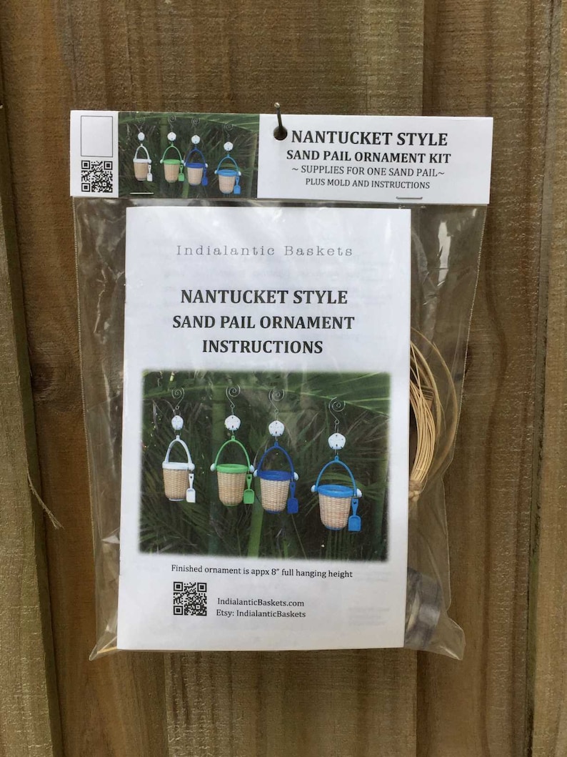 May include: A kit to make a Nantucket style sand pail ornament. The kit includes a mold, instructions, and supplies for one sand pail. The finished ornament is approximately 8 inches tall.