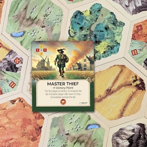 Tarjeta de Maestro Ladrón compatible con las piezas de repuesto del juego de mesa Los Colonos de Catan 6.ª Edición, Catan El Juego y las expansiones de Catan.