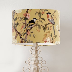 Table lamps with birds on hot sale them