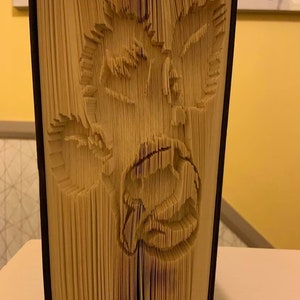 Cow cut and fold book fold pattern