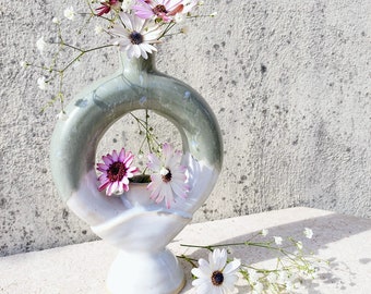 Handcrafted ceramic toroidal vase with double aperture