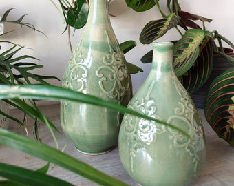 Set of handcrafted ceramic vases in jade green color