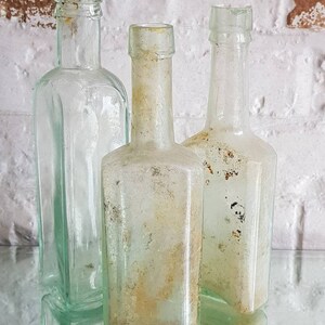 Set of 3 Vintage Clear Greenish Glass Bottles!
