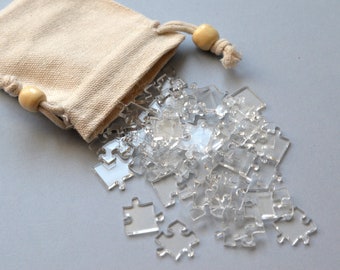 Transparentes Puzzle. Puzzle aus durchsichtigem Acryl. Verschiedene Schwierigkeitsgrade. Anspruchsvolles Puzzle. Transparentes Puzzle.