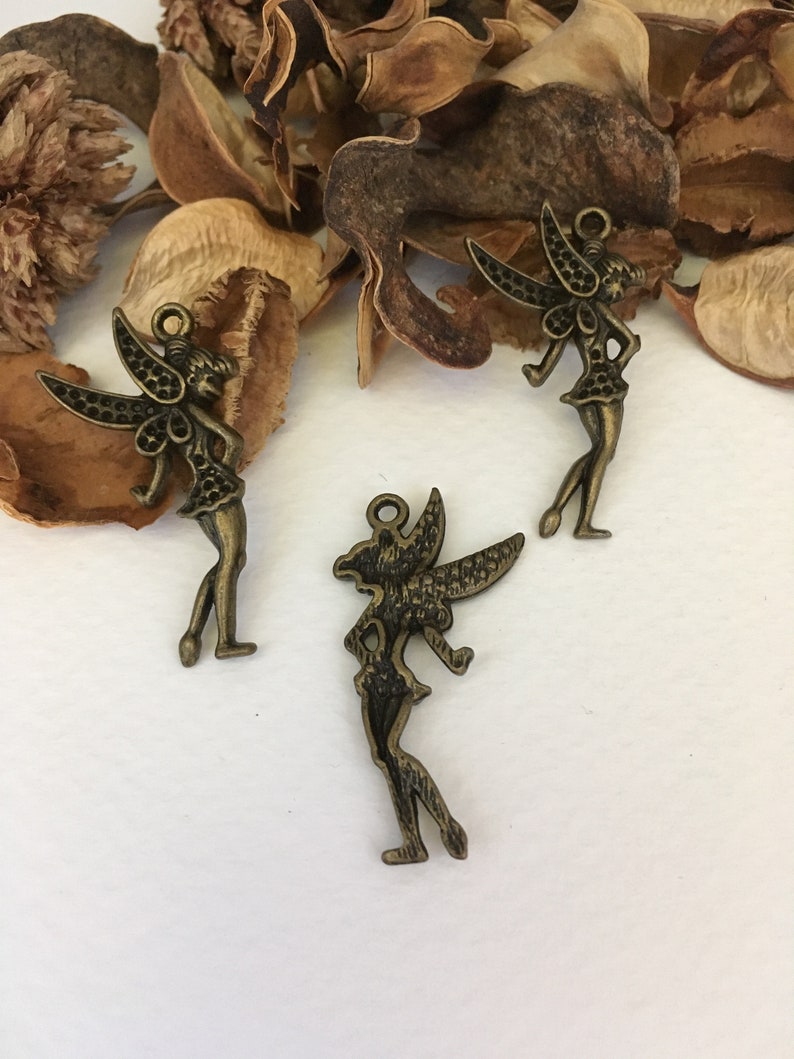124 charm pendants Tinkerbell bronze color with holes for rhinestones