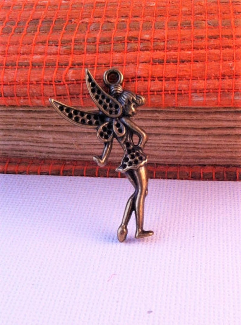 124 charm pendants Tinkerbell bronze color with holes for rhinestones